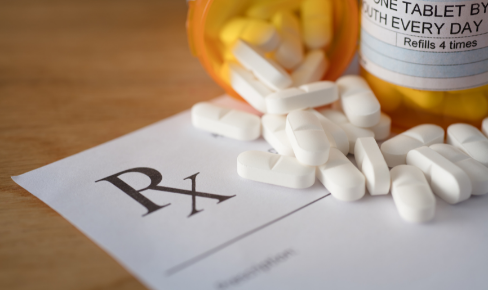 Paper prescription and pill container